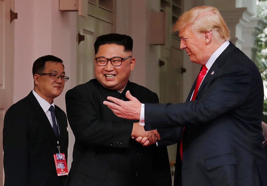 U S President Donald Trump shakes hands with North Korea's leader Kim Jong Un at the Capella Hotel on Sentosa island in Singapore on June 12, 2018. (REUTERS/Jonathan Ernst)
