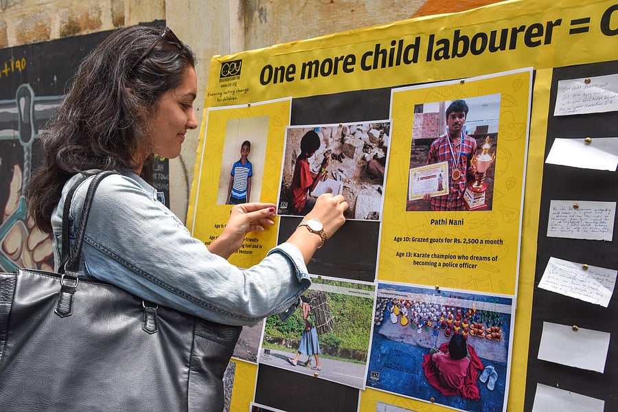 A volunteer of NGO CRY at an event organised on Church Street on Sunday. DH Photo/S K Dinesh