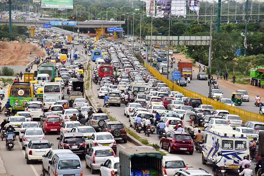 An Ambulance struck in a huge traffic on Hebbal Flyover, Ballari road, on Monday 25.06.18. Photo/ B H Shivakumar