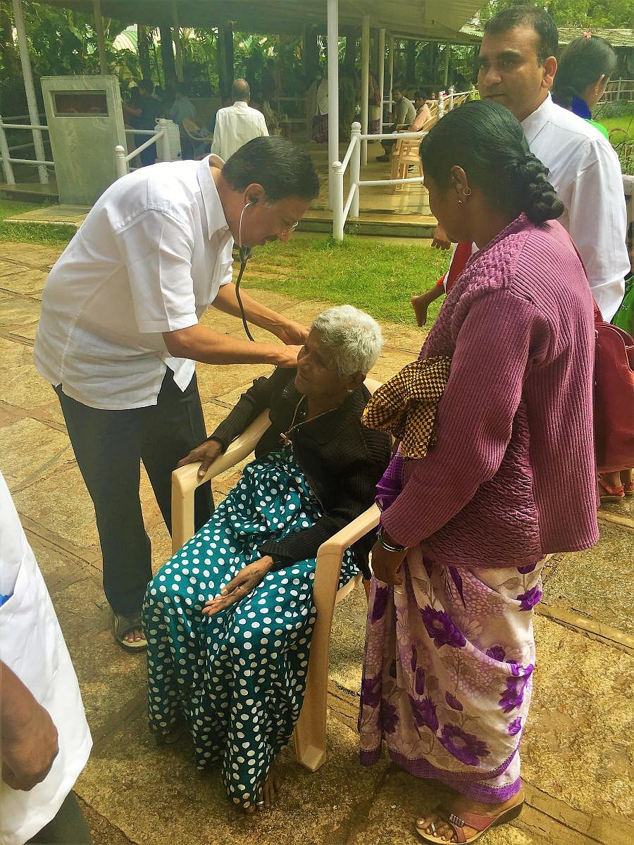 Dr Ramana Rao treating a patient.