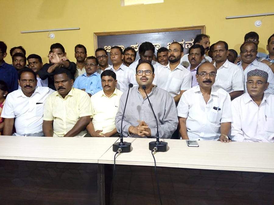 JD(S) leader Anand Asnotikar addresses media in Karwar on Saturday. DH Photo