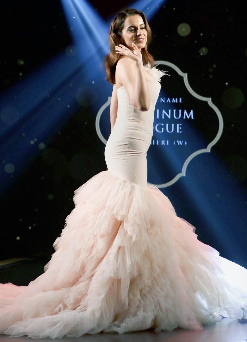 Bollywood actress Kangana Ranaut walks the ramp during Platinum Vogue Fashion show in Mumbai on Friday evening, July 27, 2018. (PTI Photo)