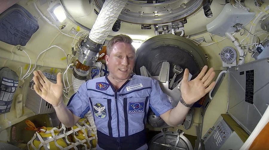 In this video grab provided by Roscosmos Space Agency Press Service on Monday, Sept. 11, 2018, Sergei Prokopyev, a Russian cosmonaut on the International Space Station, speaks in a video message from the orbiting outpost released by the Russian space agen