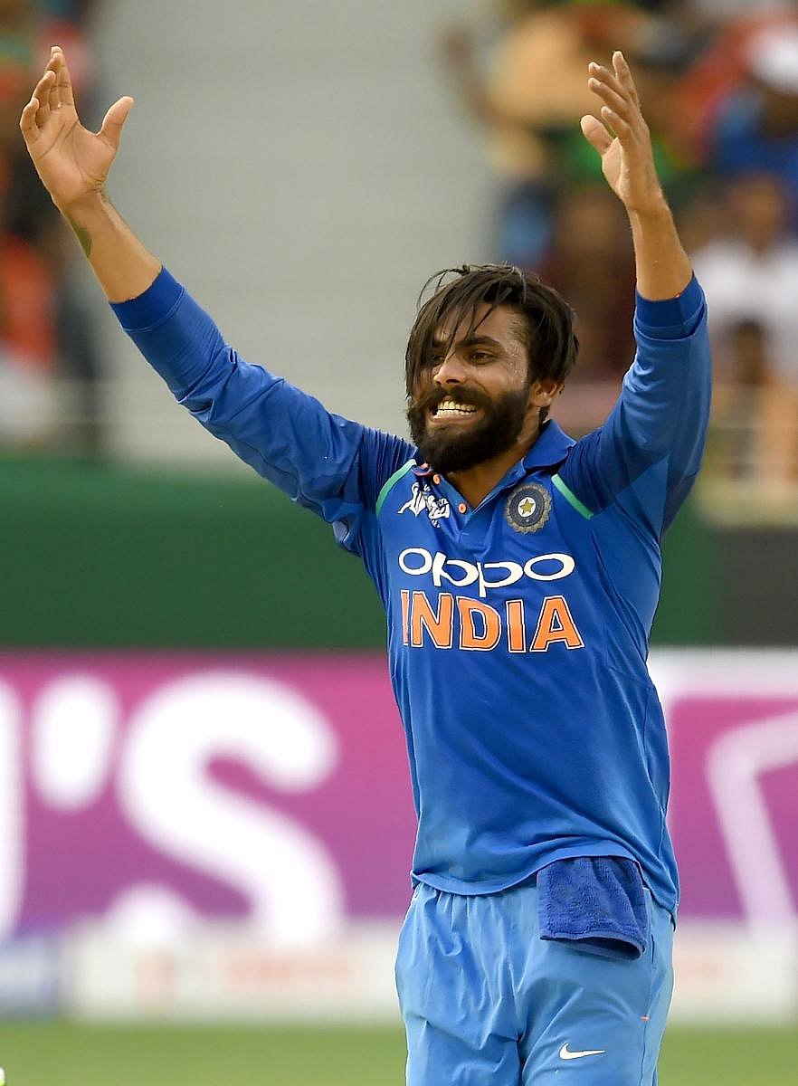 India's Ravindra Jadeja celebrates the dismissal of Bangladesh's Mohammad Mithun on Friday. AFP
