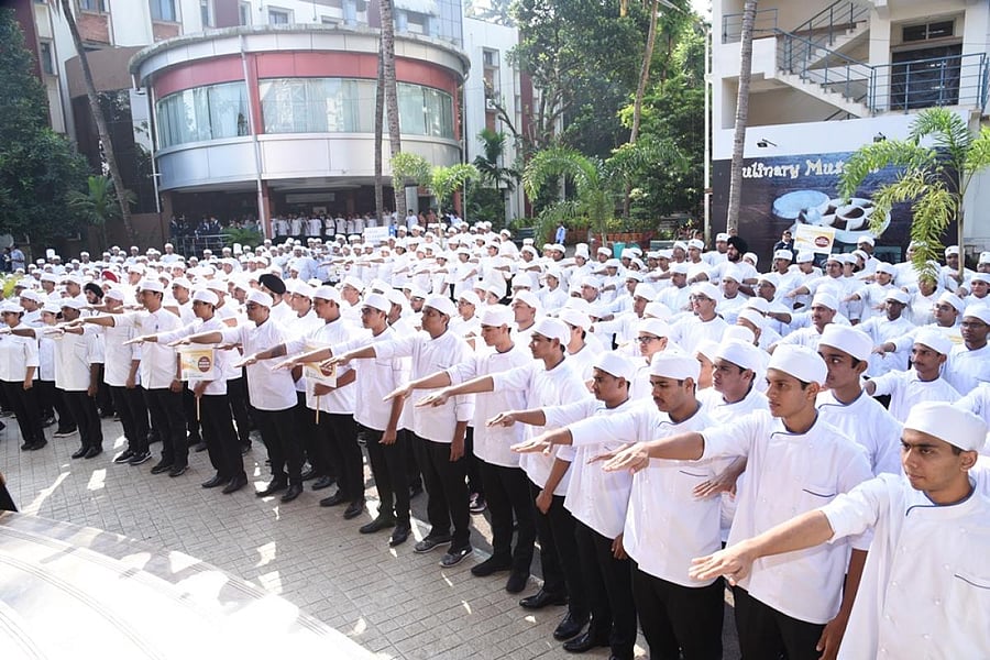 Students of Welcomgroup Graduate School of Hotel Administration take an oath as a part of International Chefs Day in Manipal.