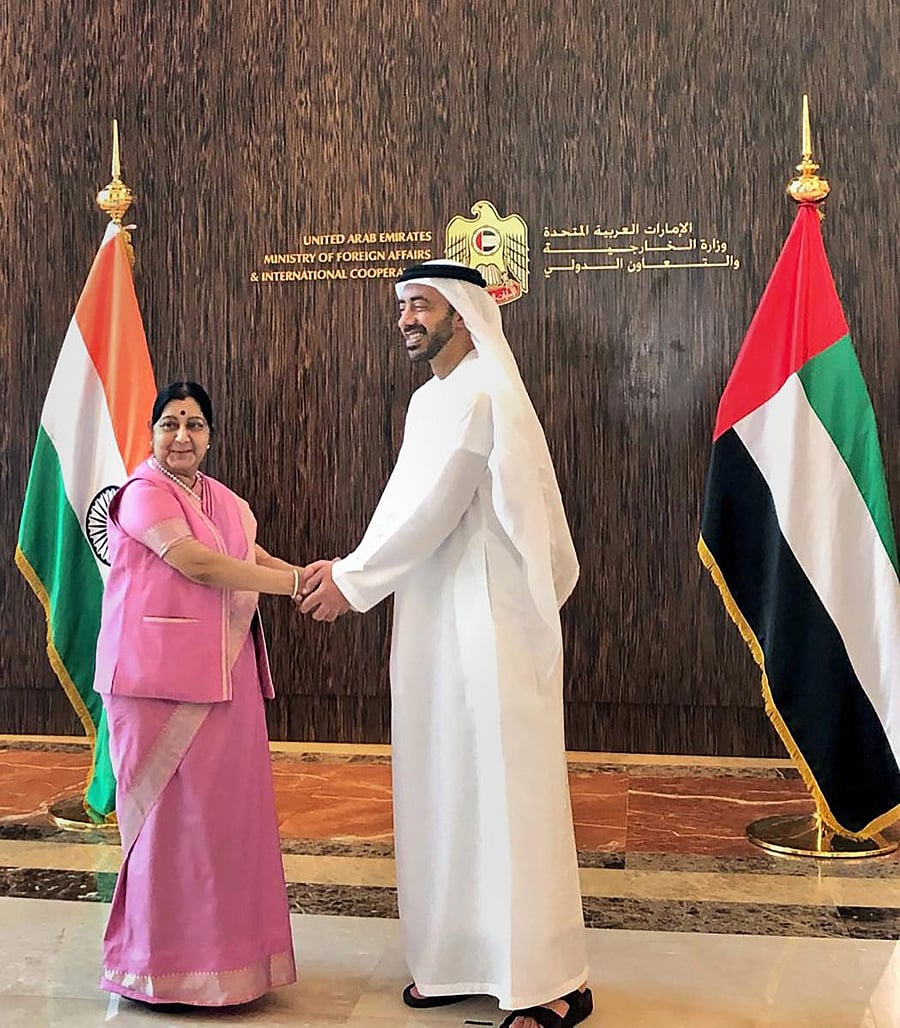 External Affairs Minister Sushma Swaraj shakes hands with her UAE counterpart Sheikh Abdullah bin Zayed Al Nahyan at India-UAE Joint Commission Meeting, in Abu Dhabi, on Tuesday. PTI