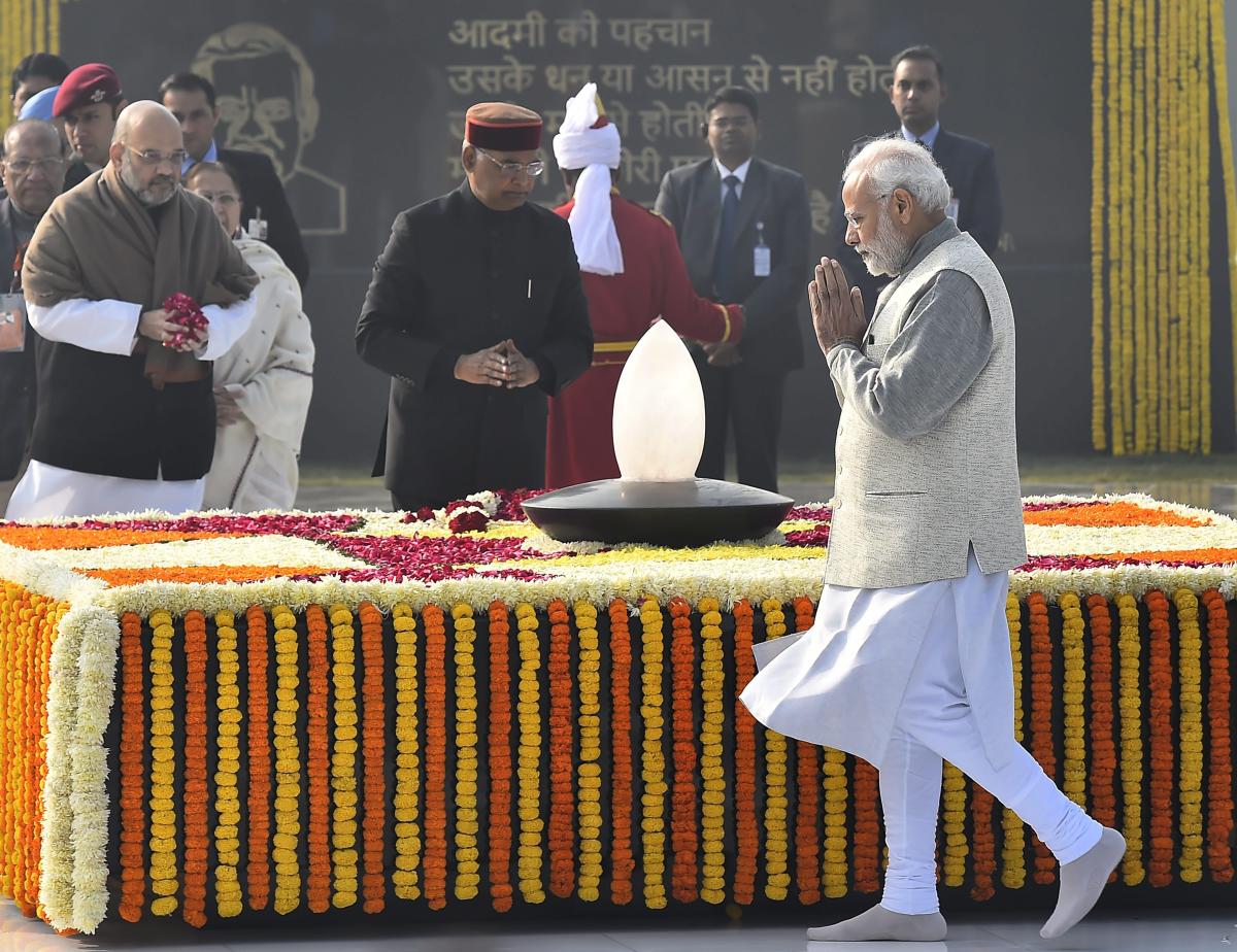Prime Minister Narendra Modi pays homage to former prime minister late Atal Bihari Vajpayee on the latter's 94th birth anniversary in New Delhi on Tuesday. President Ram Nath Kovind and BJP president Amit Shah are also seen. PTI