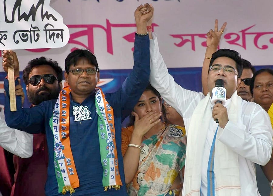 TMC MP Abhishek Banerjee (R). PTI file photo