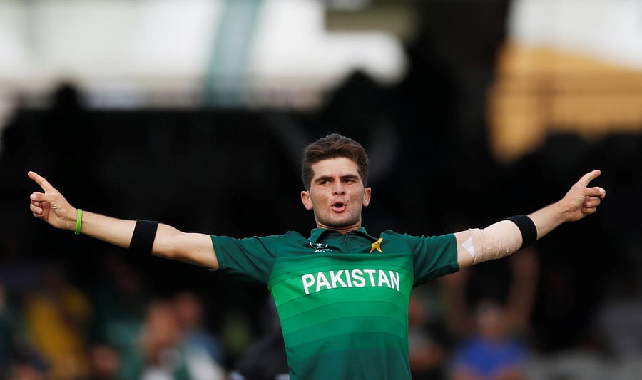 Pakistan's Shaheen Afridi celebrates taking the wicket of Bangladesh's Mustafizur Rahman. (Reuters Photo)