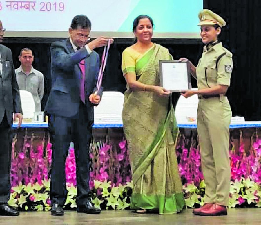 Mishal Queenie D’Costa receives gold medal from Finance Minister Nirmala Sitharaman at the campus of National Academy of Customs, Indirect Tax and Narcotics in Faridabad.