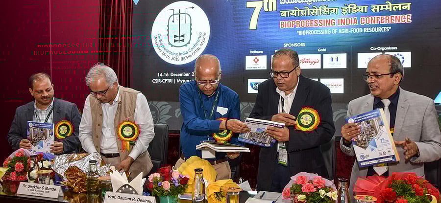 Dignitaries release a souvenir during inaugural ceremony of the seventh Bioprocessing India Conference at Central Food Technological Research Institute in Mysuru on Saturday. Director General (DG), the Council for Scientific and Industrial Research (CSIR)