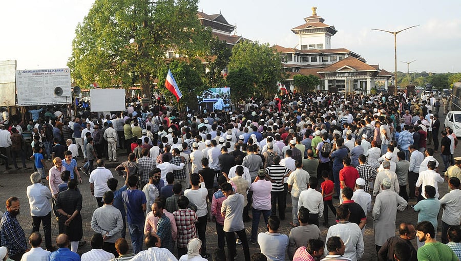 Members of various organisations stage a protest against NRC and the amended Citizenship Act in front of DC’s office in Manipal. 