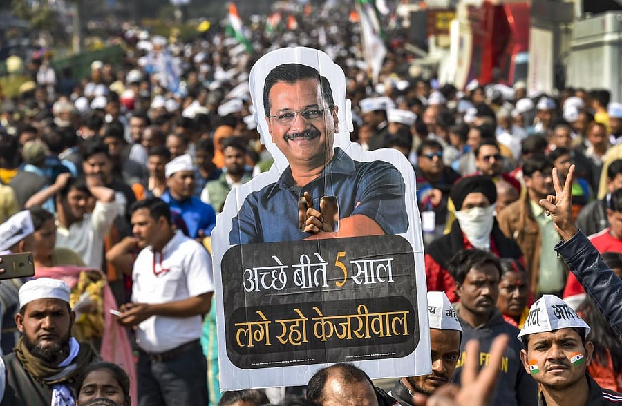 AAP volunteers at Ramlila Maidan during Delhi Chief Minister Arvind Kejriwal's swearing-in ceremony, in New Delhi, Sunday, Feb. 16, 2020. (PTI Photo)