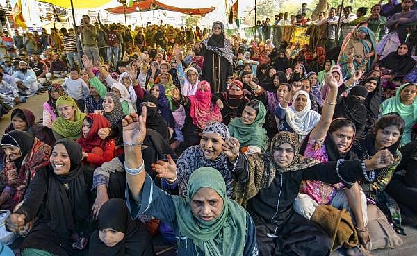 Protesters raise slogans during a demonstration against the amended Citizenship Act and National Register of Citizens at Shaheen Bagh, in New Delhi, Sunday, Feb. 23, 2020. (PTI Photo)