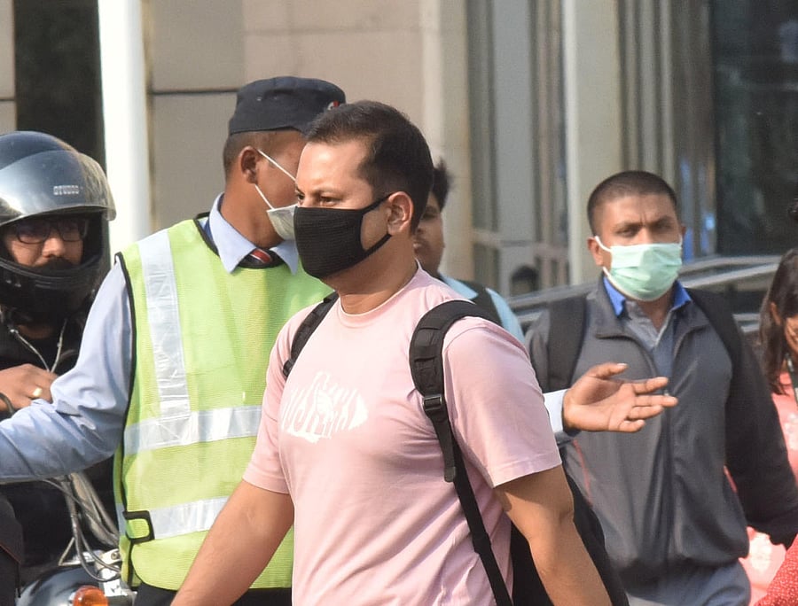 Employees sport masks at Manyata Tech Park in Bengaluru on Friday. DH Photo/Janardhan B K