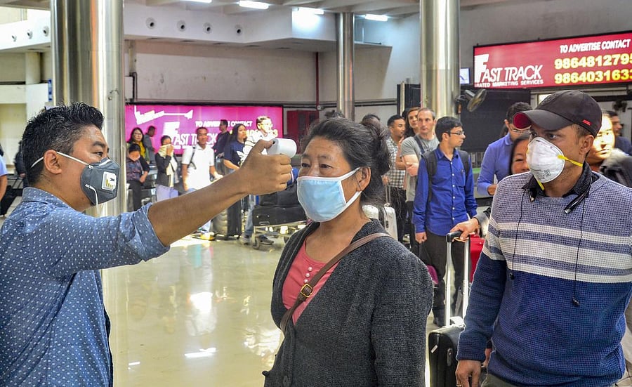 Passengers undergo a thermal screening test in the wake of novel coronavirus scare at Dimapur airport in Nagaland. (Representative image/PTI Photo)