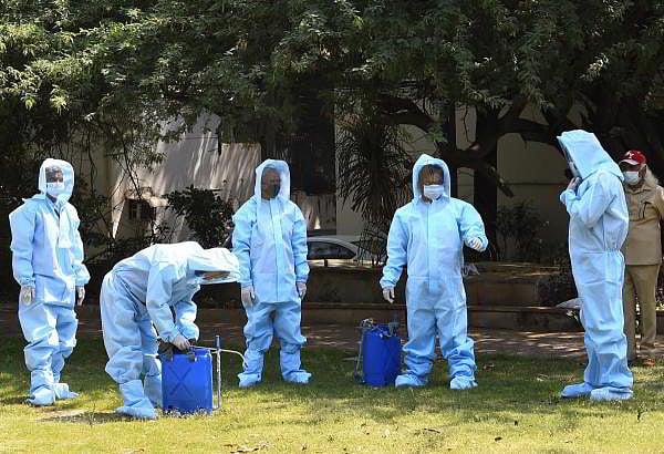 Sanitation workers (safai karamcharis) wearing Personal Protective Equipment (PPE) kit (Representative image/PTI Photo)