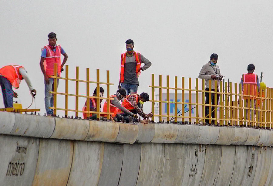 Workers resume construction of Namma Metro during the lockdown in Bengaluru, Monday, April 27, 2020. PTI