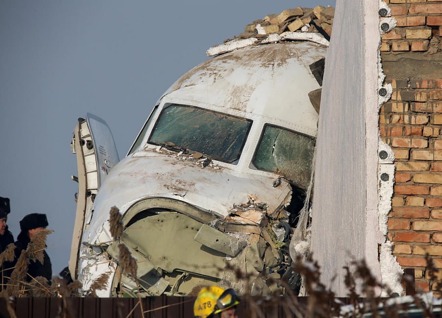 Emergency and security personnel are seen at the site of the plane crash near Almaty, Kazakhstan, December 27, 2019. (Reuters photo)