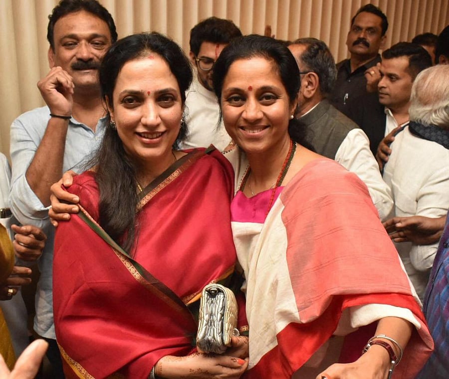 Shiv Sena President Uddhav Thackeray's wife Rashmi with Nationalist Congress Party (NCP) MP and Sharad Pawar's daughter Supriya Sule after the Shiv Sena chief was chosen as the nominee for Maharashtra chief minister's post by Shiv Sena-NCP-Congress alliance, during a meeting in Mumbai, Tuesday, Nov. 26, 2019. (PTI Photo)