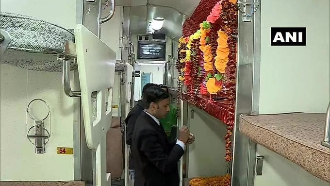 Seat number 64 of coach B5 in Kashi Mahakal Express (Varanasi-Indore) turned into a mini-temple of Lord Shiva. (ANI Photo)