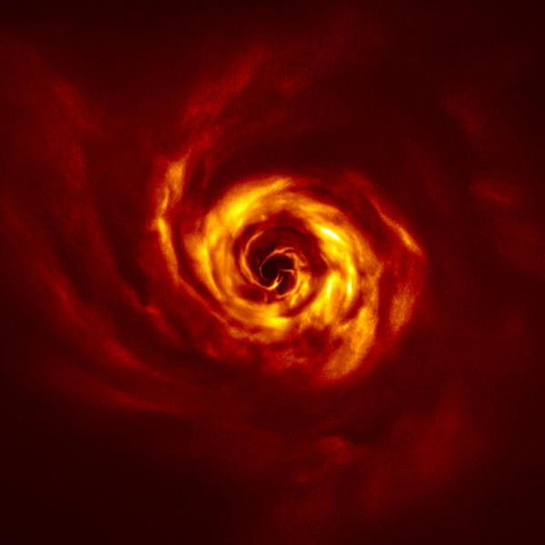 The disc around the young AB Aurigae star, where ESO's Very Large Telescope (VLT) has spotted signs of planet birth is seen in an image obtained with the VLT's SPHERE instrument in polarized light and released May 20, 2020. Close to the centre of the image, in the inner region of the disc, A 'twist' (in very bright yellow) is seen that scientists believe marks the spot where a planet is forming. (Credit: ESO/Boccaletti et al/Handout via REUTERS)