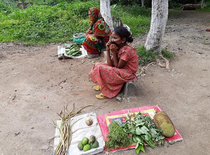 Rumi Kumari (name changed), a class VI student selling vegetables in Guwahati (DH Photo/Sumir Karmakar)