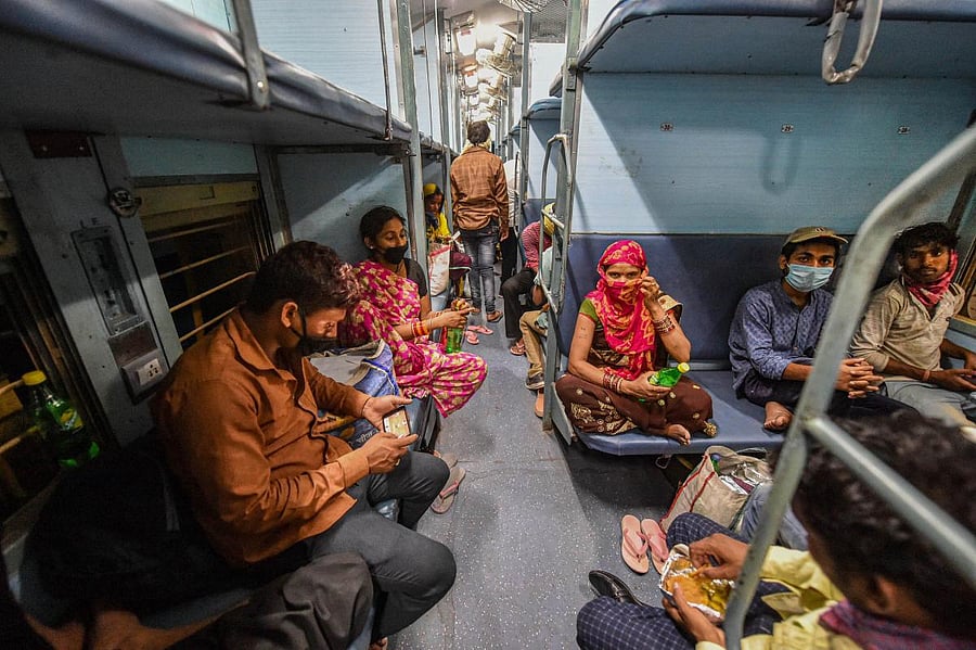 Migrants board a train (PTI Photo)