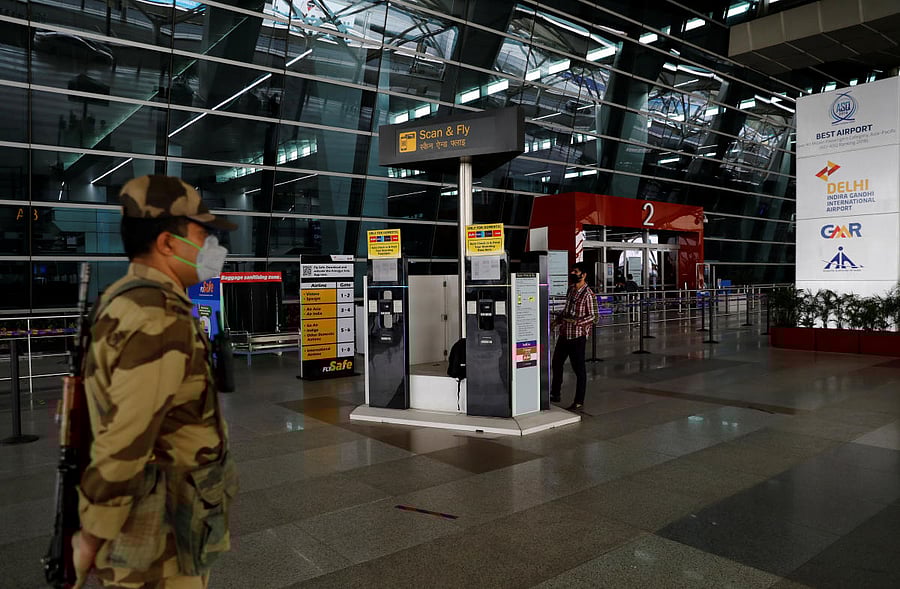 A man checks the Scan & Fly kiosks, after the government allowed domestic flight services to resume from coming Monday (Reuters Photo)