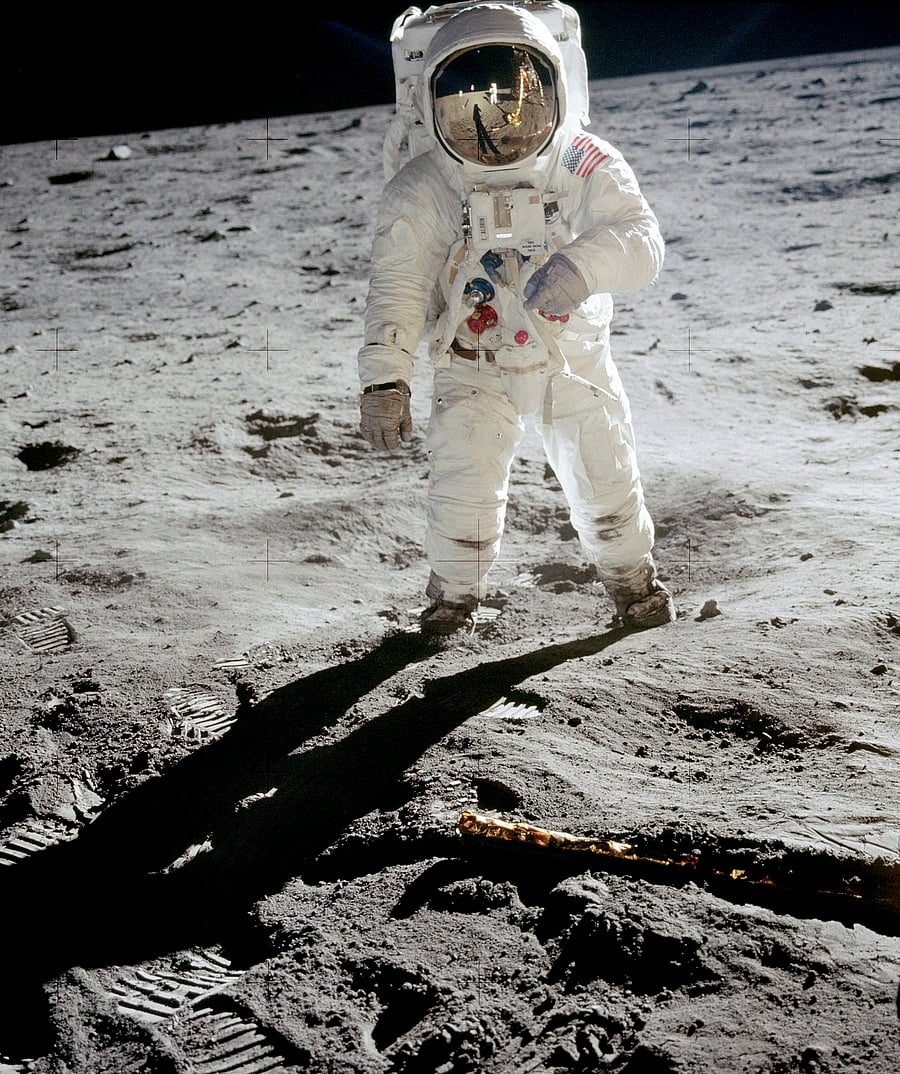In this 1969 photo released by NASA, astronaut Buzz Aldrin walks on the surface of the moon near the leg of the lunar module Eagle during the Apollo 11 mission. Astronaut Neil Armstrong, who took the photograph, is reflected in Aldrin's visor. From Thursday, Oct. 12, 2017 through Nov. 2., Skinner Auctioneers and Appraisers is selling more than 400 vintage prints of photos, including the photo of Aldrin, made by American astronauts from 1961 to 1972. (AP/PTI)