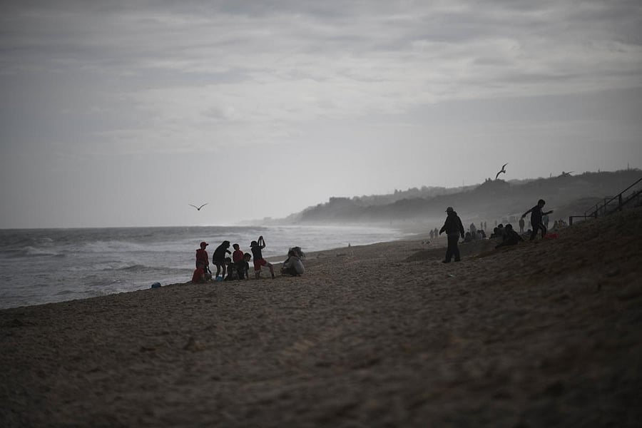 People gather during Memorial Day weekend on May 24, 2020 in Montauk, New York. AFP