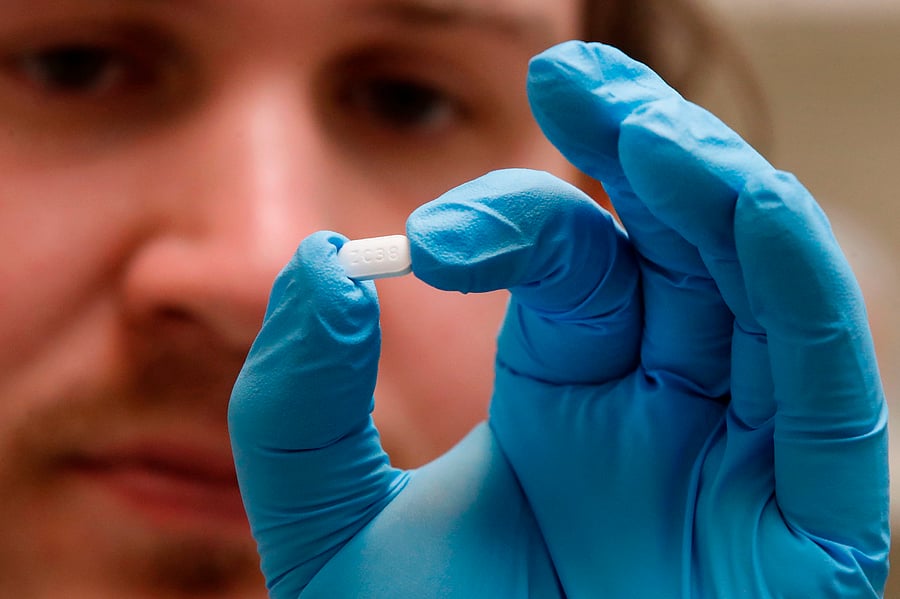 A few weeks later, France's ANSM drugs agency warned of a sharp rise in reports of hydroxychloroquine side effects since the outbreak. (Credit: AFP Photo)