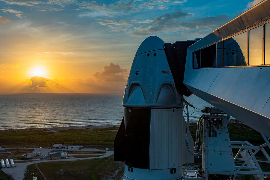 Gray skies loomed over Florida's Atlantic coast on May 26, just one day before two astronauts were set to blast off aboard a SpaceX capsule on the most dangerous and prestigious mission NASA has ever entrusted to a private company. (Photo by SPACEX / AFP)