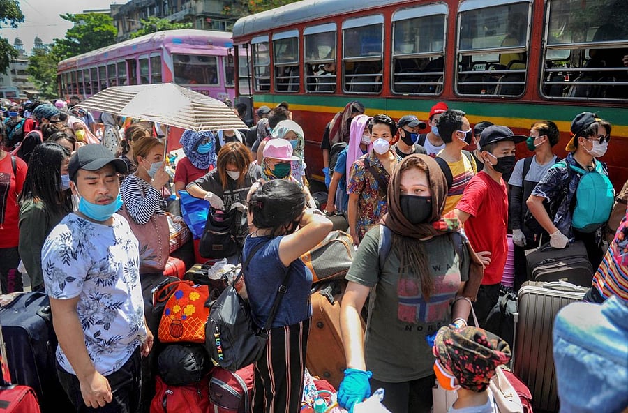  People from Manipur and other parts of northeast board buses (PTI Photo)