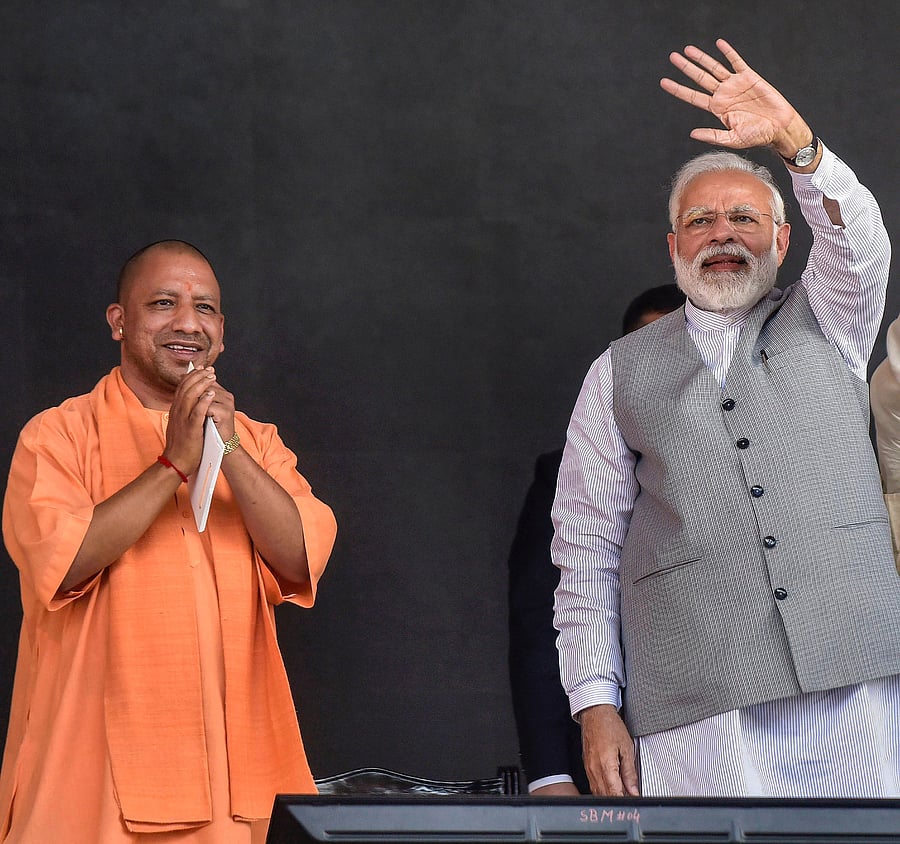 Uttar Pradesh CM Yogi Adityanath (L) with PM Narendra Modi (PTI photo)