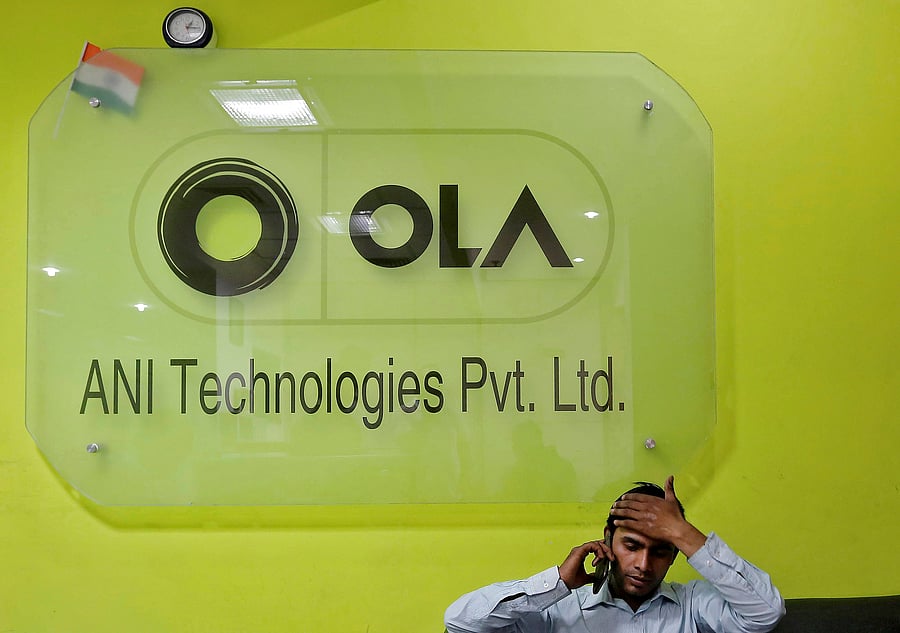 NCLAT observed that none of the two enterprises — Ola and Uber — is independently holding a dominant position in the relevant market of providing services and not operating as a joint venture or a group. (Reuters Photo)