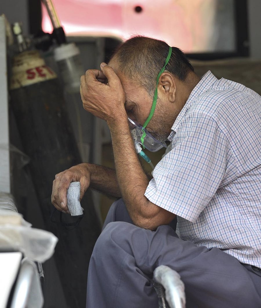 New Delhi: A suspected COVID-19 patient being brought to a hospital in an ambulance, during the ongoing nationwide lockdown to curb the spread of coronavirus, in New Delhi, Tuesday, June 2, 2020. Credit: PTI Photo/Kamal Kishore