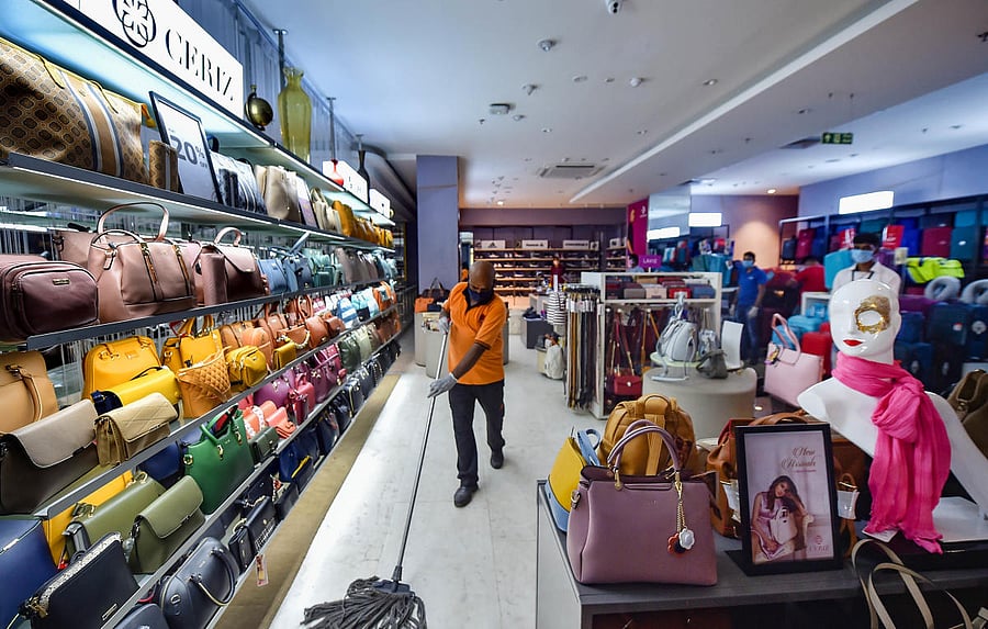 Kolkata: A worker sanitises a floor at Metro Central Mall, after authorities permitted opening of all shopping complexes in the fifth phase of nationwide COVID-19 lockdown in Kolkata, Tuesday, June 9, 2020. (PTI Photo/Swapan Mahapatra) (PTI09-06-2020_0001