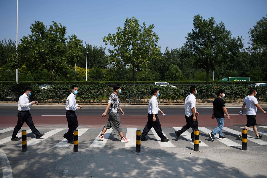 Beijing News said that all couriers in the city would be tested by next week. Credit: AFP Photo