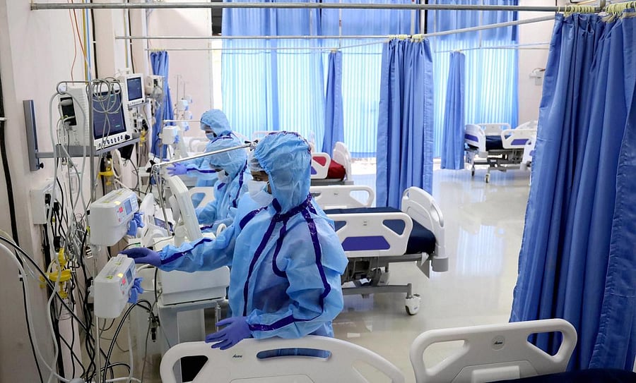 Medics during the inauguration of a COVID-19 hospital with 1000 beds by Maharashtra Uddhav Thackeray via video conferencing at Global Impact Hub, during the ongoing nationwide lockdown, at Saket in Thane, Wednesday, June 17, 2020. Credit/PTI Photo