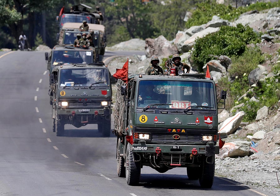 An Indian Army convoy moves along a highway leading to Ladakh. Credits: Reuters Photo