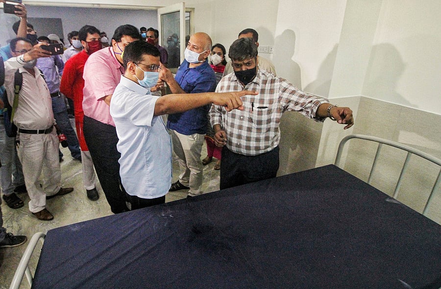 elhi Chief Minister Arvind Kejriwal with Deputy CM Manish Sisodia inspect a hospital with 450 beds which is all set to open at Burari. Credits: PTI Photo