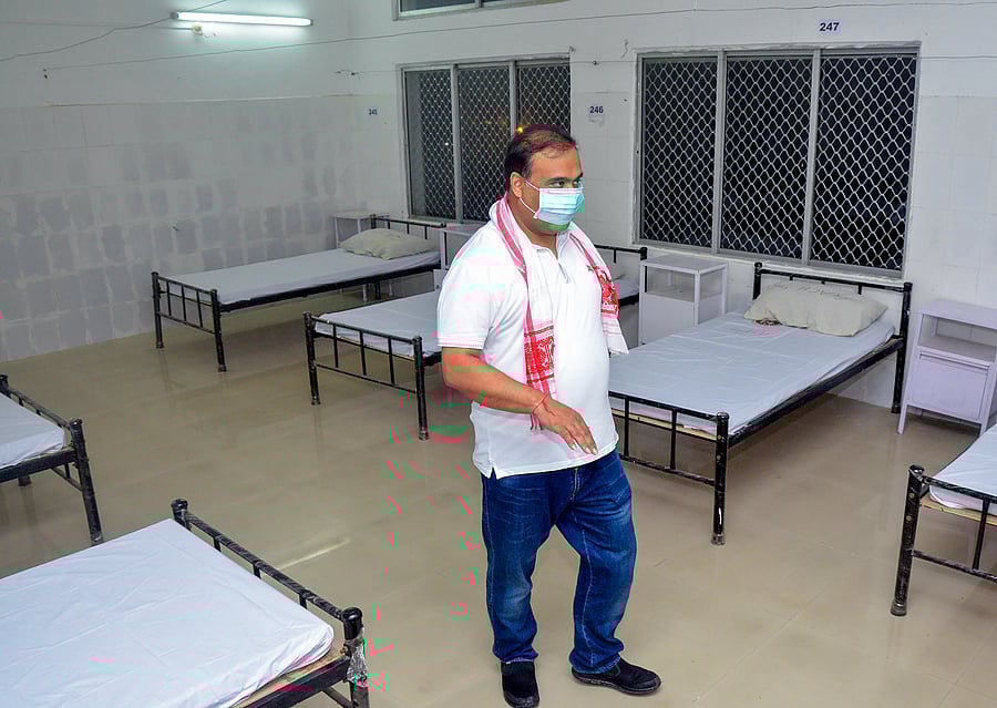 Assam State Finance, Health and Family Welfare Minister Himanta Biswa Sarma wearing a face mask reviews a quarantine centre setup for COVID-19 patients, at Jalukbari in Guwahati. Credit: PTI Photo