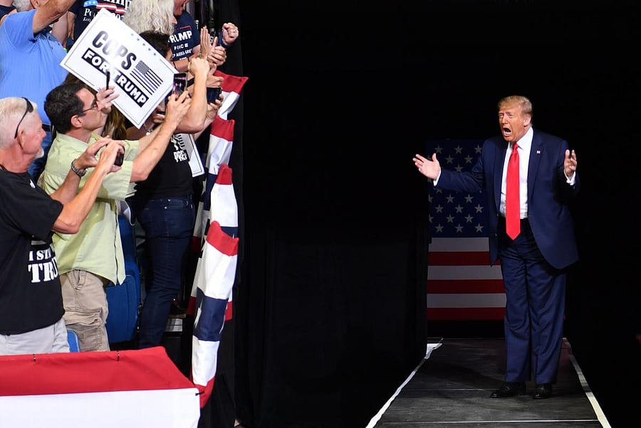 US President Donald Trump arrives for a campaign rally at the BOK Center. AFP