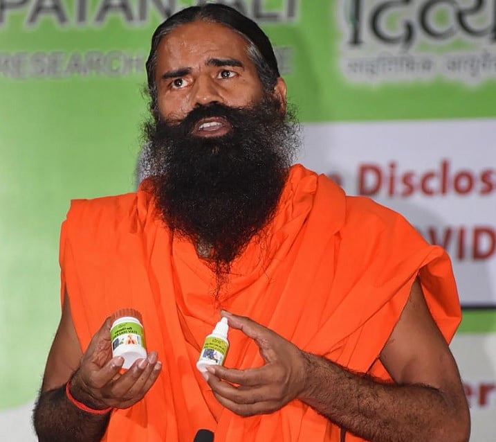 Yoga guru Ramdev addresses the media during the launch of 'Coronil' and 'Swasari', ayurvedic medicines claimed by Patanjali to cure coronavirus disease, in Haridwar, Tuesday, June 23, 2020. (PTI Photo)