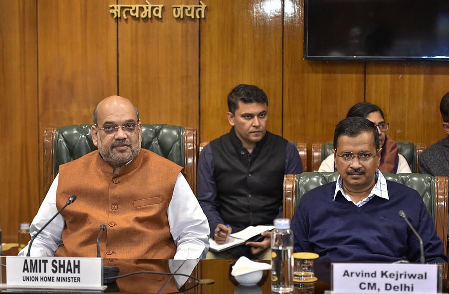 Amit Shah and Arvind Kejriwal. Credit: PTI