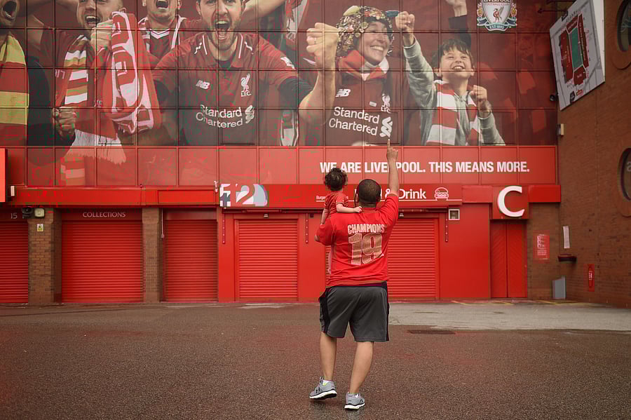 Liverpool were crowned Premier League champions without kicking a ball on Thursday as Chelsea's 2-1 win over Manchester City ended the Reds' 30-year wait to win the English title. Jurgen Klopp's men sealed a 19th league title for the club with a record seven games left to play after City's defeat left them 23 points adrift of Liverpool at the top. (Photo by AFP)