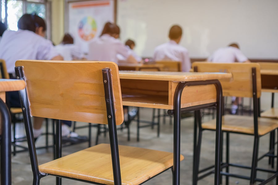 Opinions are divided over the recent decisions of the state government to ban online classes and conduct SSLC exams. Credits: DH Photo
