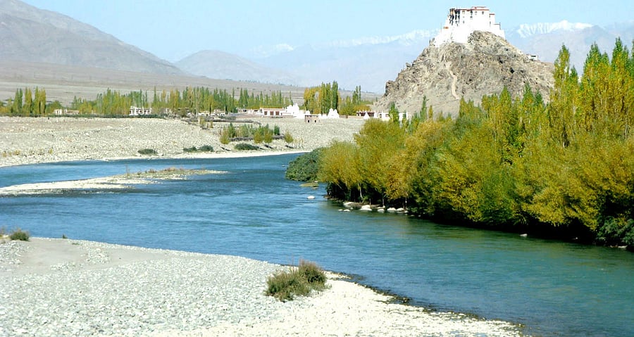 TOPSHOT - An Indian fighter jet flies over Leh, the joint capital of the union territory of Ladakh, on June 25, 2020. - Indian fighter jets roared over a flashpoint Himalayan region on June 24 as part of a show of strength following what military sources