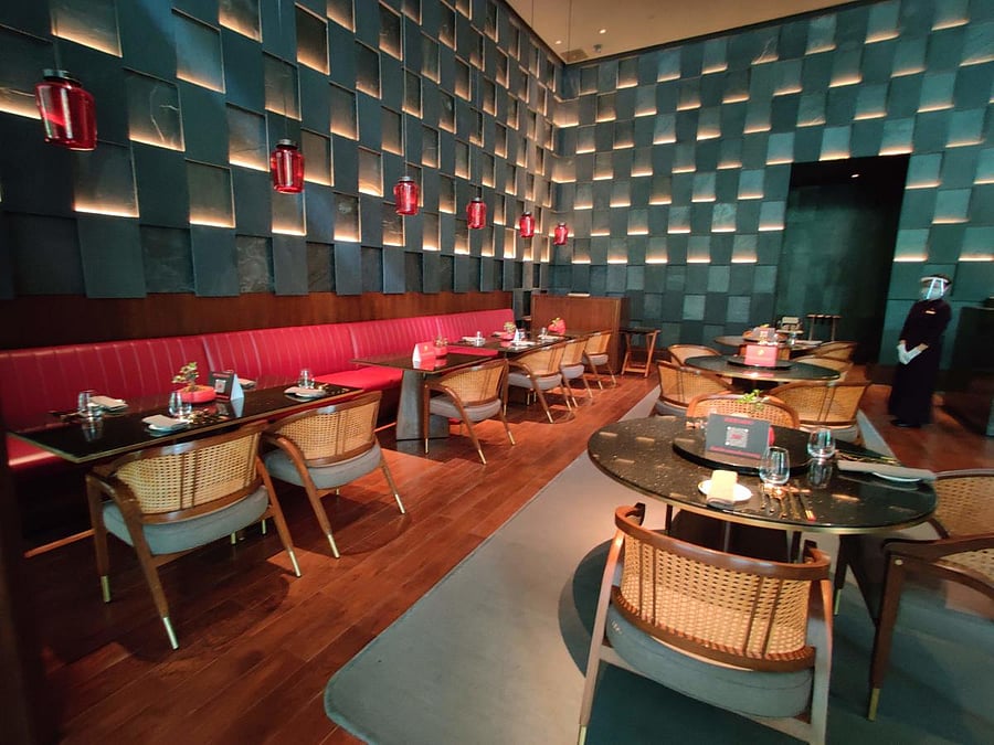 At The Oberoi, MG Road, alternate tables are left unused.